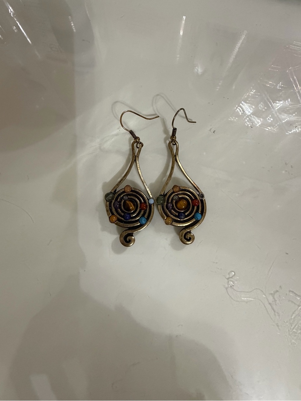 Antique gold earrings with spiral design and Multi colored beads